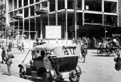 The Commonwealth Bank was designed by Herwald and John Kirkpatrick, with construction beginning in 1913. At this time Martin Place was a busy thoroughfare with horses and carts, and early automobiles. The building was one of the first large scale all steel-framed skyscrapers in Australia. The new structure rose to the full height allowed by the Height of Buildings Act of 1912 (NSW) which prohibited the construction of any building higher than 150 feet.