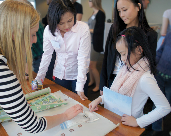 Visitors to Note Issue Department learn about banknote production, September 2014