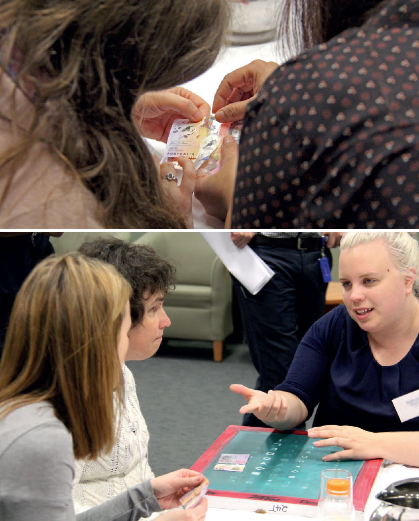 Attendees at the tactile feature preview event learn about the development of the tactile feature from Note Issue Department staff, June 2016