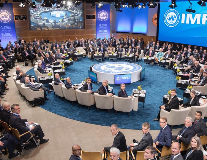 Deputy Governor Guy Debelle (left, front) and Treasurer the Hon Scott Morrison MP (centre) at the International Monetary and Financial Committee Plenary, Washington DC, October 2016